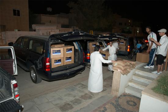 Distribution of charity baskets and clothes during Eid