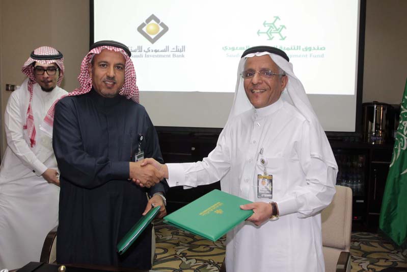 Signing the mortgage agreement with the Industrial Development Fund